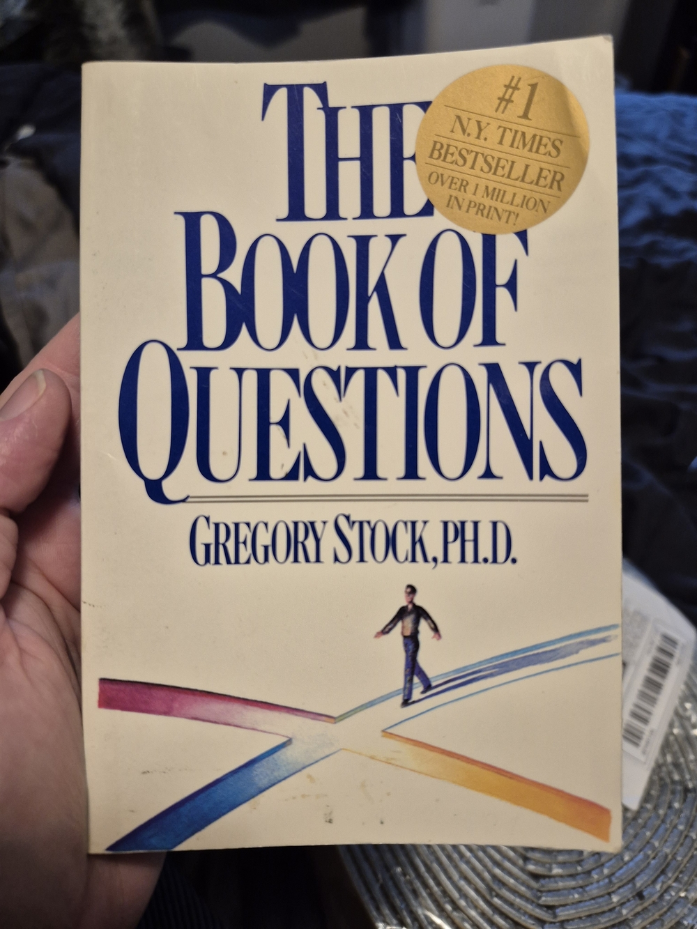 The Book of Questions by Gregory Stock, Ph.D. - Cream Cover with Blue Text